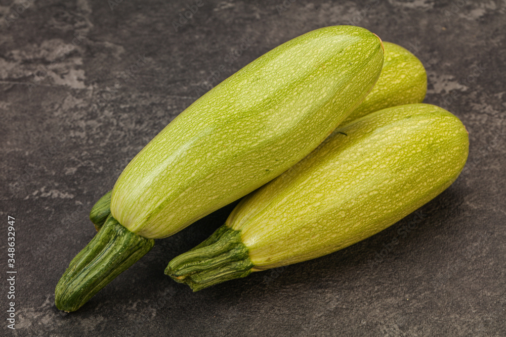 Young tasty zucchini over board Young tasty zucchini over board