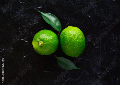 green lime  isolated on black background.  top view