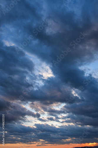 Fototapeta Naklejka Na Ścianę i Meble -  Stormy sky with storm clouns on the sunset with beautiful sun
