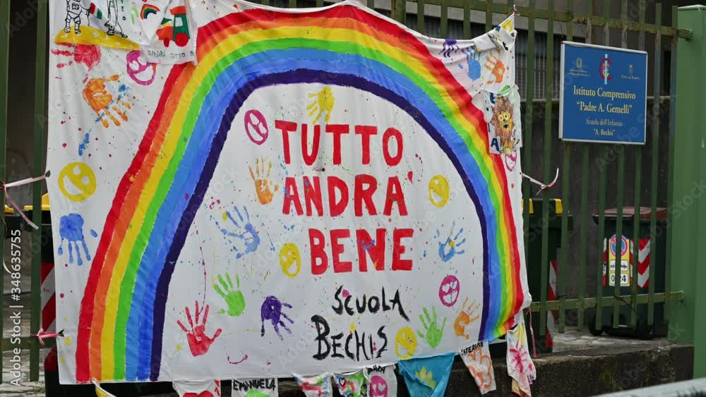 Turin,Piedmont,Italy. May 2020. Coronavirus pandemic. At the entrance of the school a sheet with the rainbow design has been hung and the message Everything will be fine