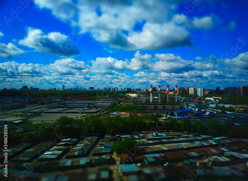 Moscow industrial chimneys during summertime bokeh photo