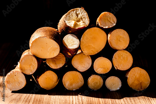 Group of organic cassava  also known as Yuca Root  Cassava  Medioc  Mandioca  Tapioca  Aipim . Healthy fresh cassava is grown on an organic farm. Royalty high-quality free stock image of vegetables.