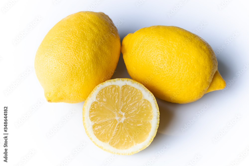 Two and a half lemons isolated on a white background Two and a half lemons isolated on a white background