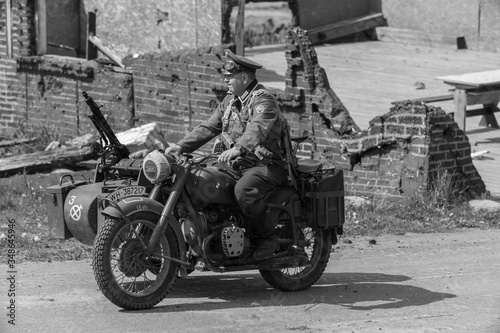 Black and white photography, reconstruction of a military battle World War II photo