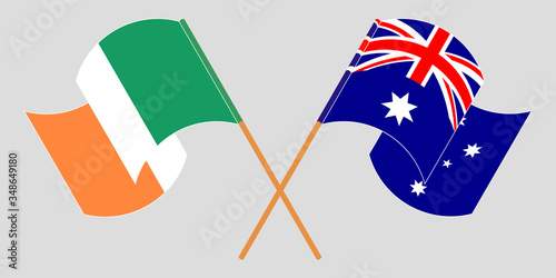 Crossed and waving flags of Ireland and Australia