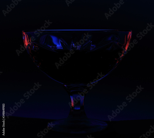 close up of crystal bowl on black background