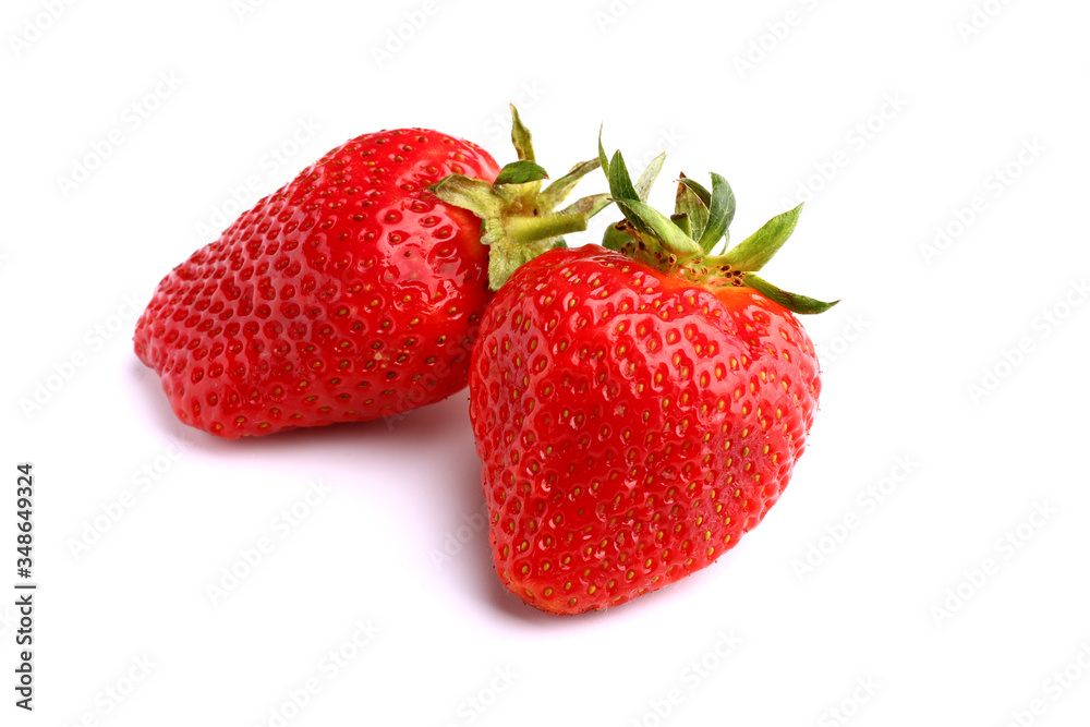 A pair of strawberries on white isolated background A pair of strawberries on white isolated background
