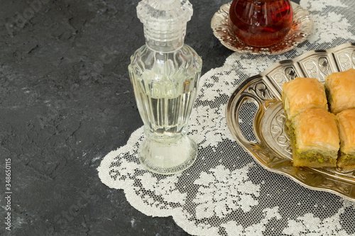 The Turkish traditional dessert Baklava and cologne concept for Muslim Ramadan festival.