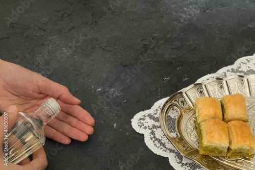 The Turkish traditional dessert Baklava and cologne concept for Muslim Ramadan festival.