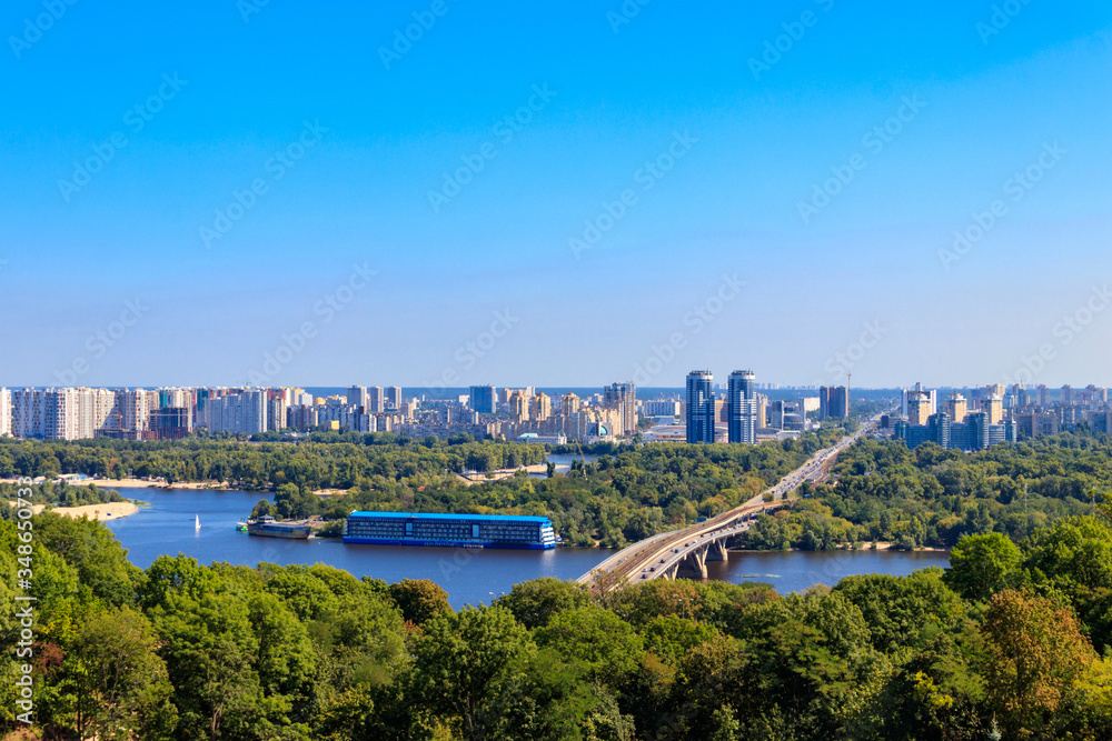 Fototapeta premium Aerial view of Metro bridge and the Dnieper river in Kiev, Ukraine. Kyiv cityscape