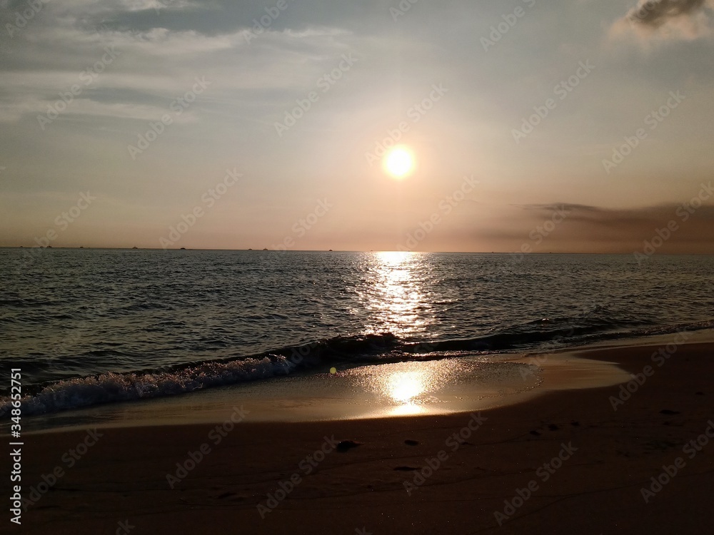 beach with a sunset background