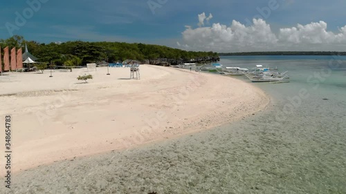 Flying over beautiful beach of tiny Virgin Island, Bantayan, Cebu, Philippines photo