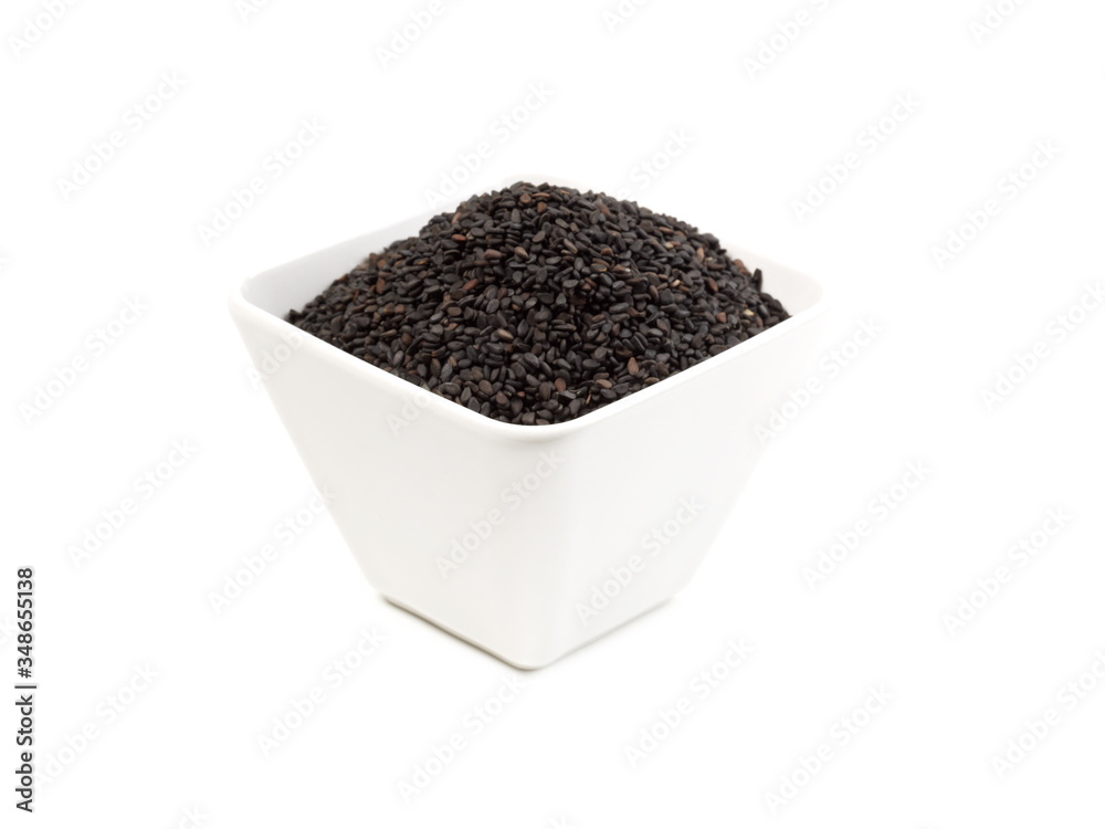 black sesame seeds, isolated on white background black sesame seeds, isolated on white background
