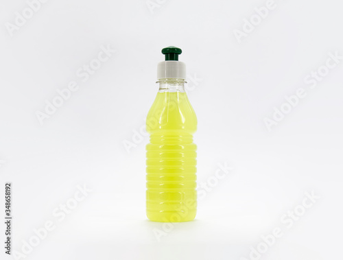 Plastic bottle with lemon juice fresh nature on white background isolation