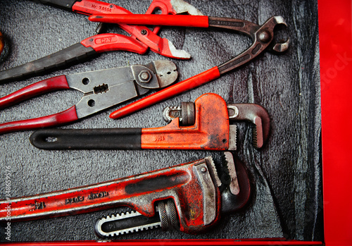 Red wrenches and pliers photo