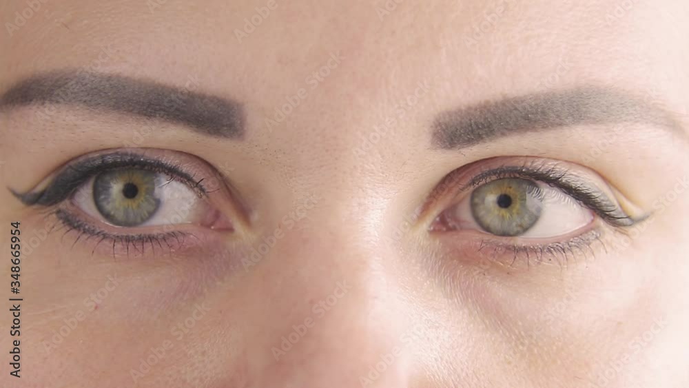 result of tattooing of eyelids and eyebrows female green eyes. result of tattooing of eyelids and eyebrows female green eyes.