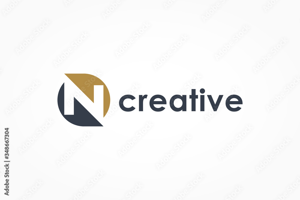 Abstract Initial Letter N Logo. Blue and Gold Circle Shape Combination with Negative Space Letter inside. Usable for Business and Technology Logos. Flat Vector Logo Design Template Element. Abstract Initial Letter N Logo. Blue and Gold Circle Shape Combination with Negative Space Letter inside. Usable for Business and Technology Logos. Flat Vector Logo Design Template Element.