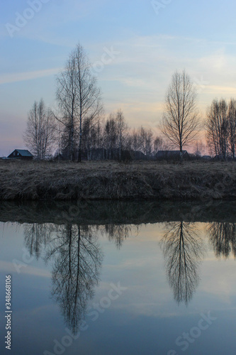 the sun sets over the horizon, the sun's rays.landscape at sunset