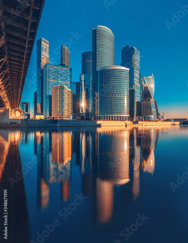Business Center Moscow-City. Towers and their reflection in the Moscow River. Modern architecture. Moscow International Business Center "Moscow-City"