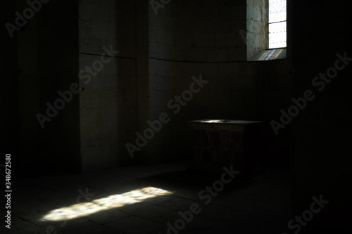 Fototapeta Interior Of Empty Room With Sunlight Through Window In Monastery
