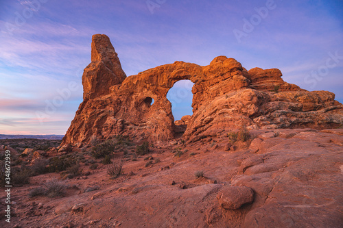 Turret Arch in Belt of Venus at Arches National Park when Sun is rising