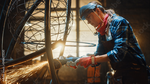 Fotografie Close Up of Young Female Fabricator in Safety Mask