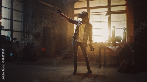 Talented Female Artist Wearing Virtual Reality Headset and Holding Digital Joysticks. She s Working on a Painting or Sculpture  Uses Motion Controllers To Create Concept Art. Creative Modern Studio.