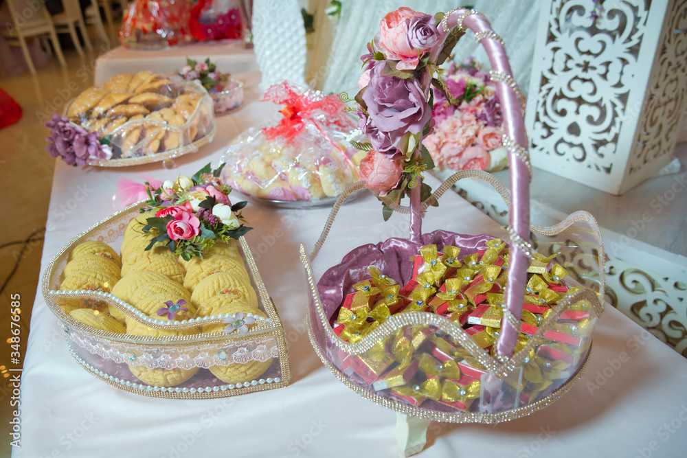 Engagement basket . Basket with sweets stands on the table . Azerbaycan Baku 07.12.2019 .