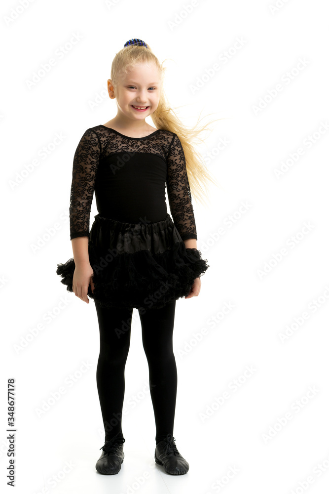 Cute little girl gymnast getting ready to perform a difficult ex Cute little girl gymnast getting ready to perform a difficult ex