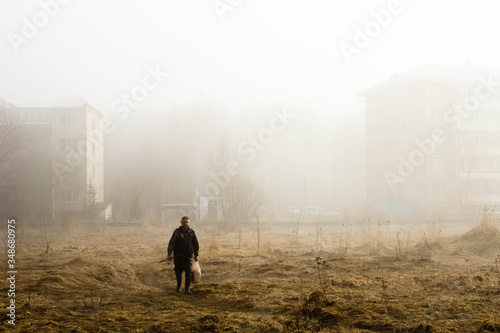 spring city landscape in fog