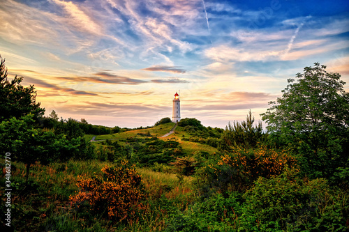 lighthouse Dornbusch on isle of Hiddensee in the baltic sea photo