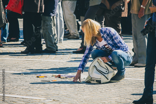 Εκτύπωση καμβά Young woman dropped a white purse and all contents have dropped on the floor