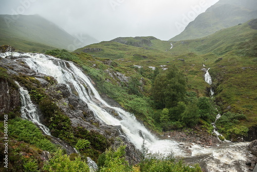 Glencoe, Scotland, August 14th 2017; Meeting of Three Waters. Waterfall located at the foot of the Three Sisters of Glen Coe. Water comes from three different sources before joining Loch Achtriochtan.