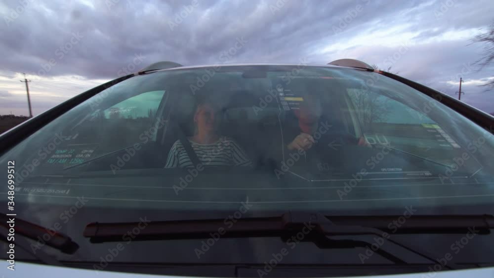Two people traveling in smart car Two people traveling in smart car