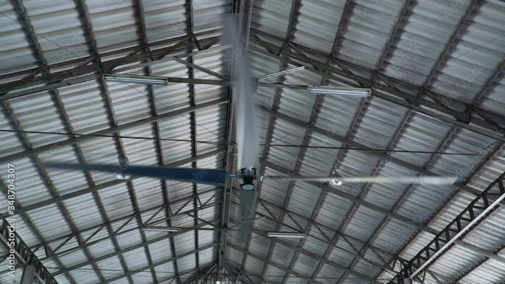 Large industrial ceiling fan inside of a large indoor soccer facility Large industrial ceiling fan inside of a large indoor soccer facility