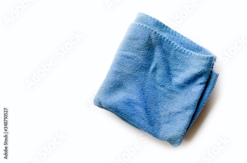 Old dirty torn rag isolated on white background. Cleaning rag. 