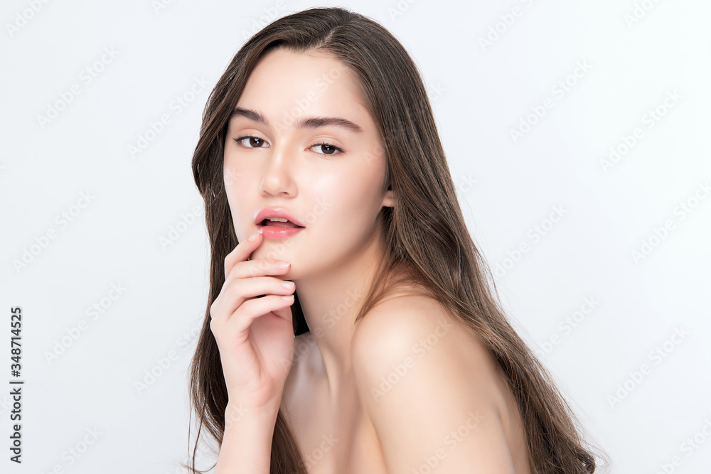 Beautiful Young Woman touching her clean face with fresh Healthy Skin, isolated on white background, Beauty Cosmetics and Facial treatment Concept Beautiful Young Woman touching her clean face with fresh Healthy Skin, isolated on white background, Beauty Cosmetics and Facial treatment Concept