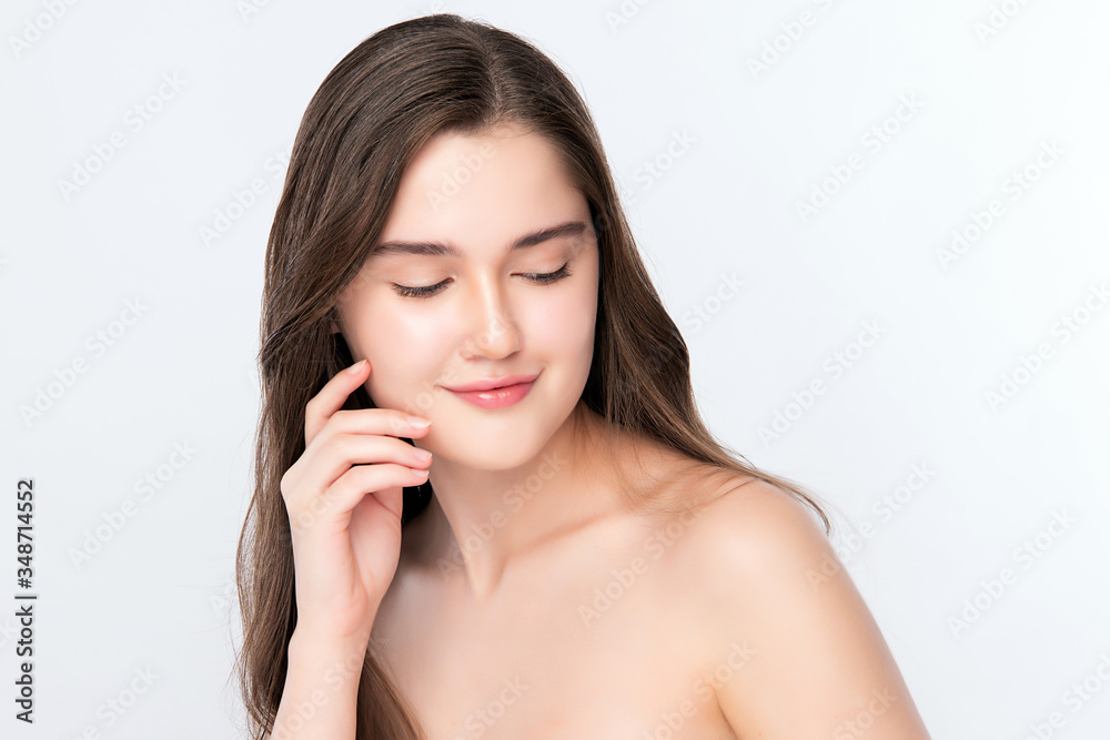 Beautiful Young Woman touching her clean face with fresh Healthy Skin, isolated on white background, Beauty Cosmetics and Facial treatment Concept Beautiful Young Woman touching her clean face with fresh Healthy Skin, isolated on white background, Beauty Cosmetics and Facial treatment Concept