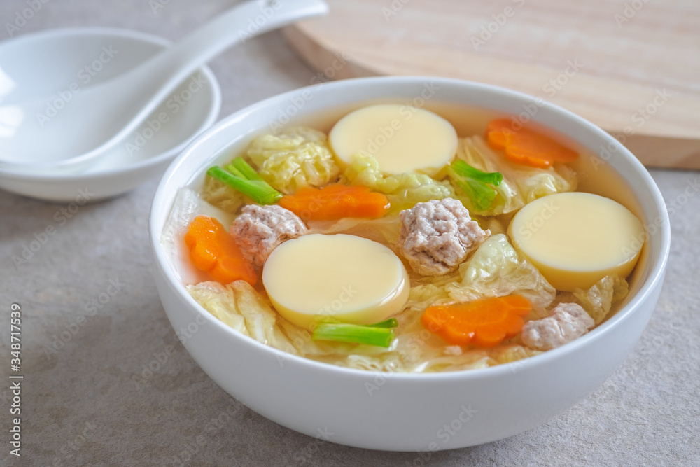 Clear soup with egg tofu and minced pork, Thai food Clear soup with egg tofu and minced pork, Thai food