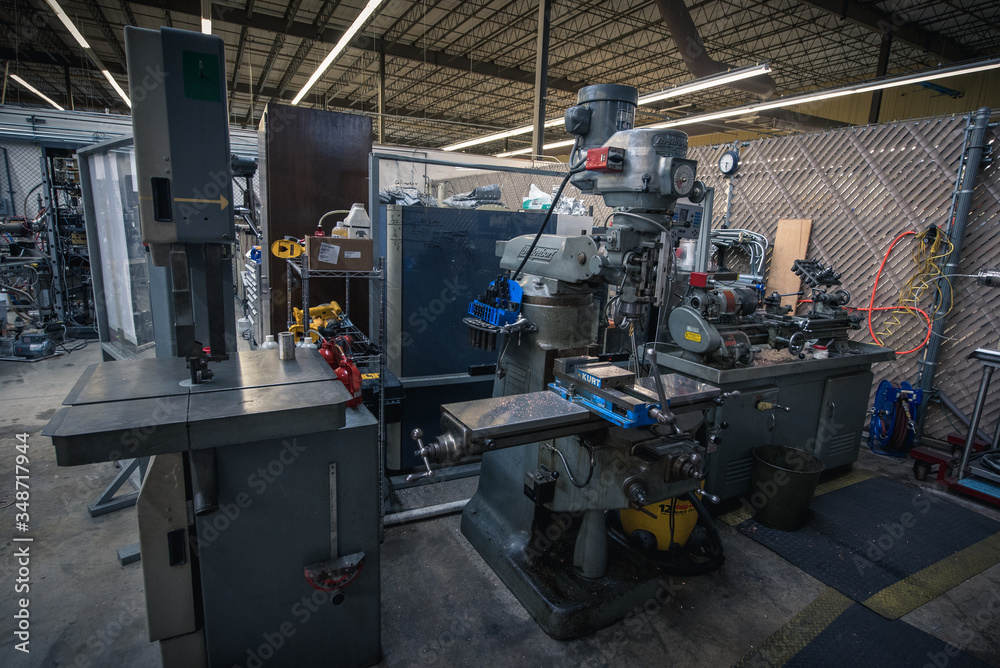 Machine shop featuring lathe, mill, and band saw for building and repairing things Machine shop featuring lathe, mill, and band saw for building and repairing things