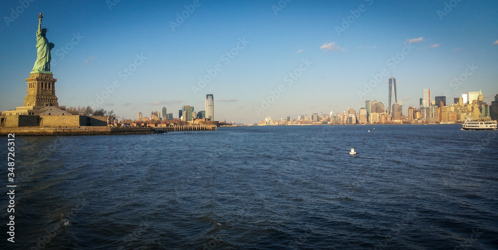 Liberty Statue and Manhattan skyline Liberty Statue and Manhattan skyline