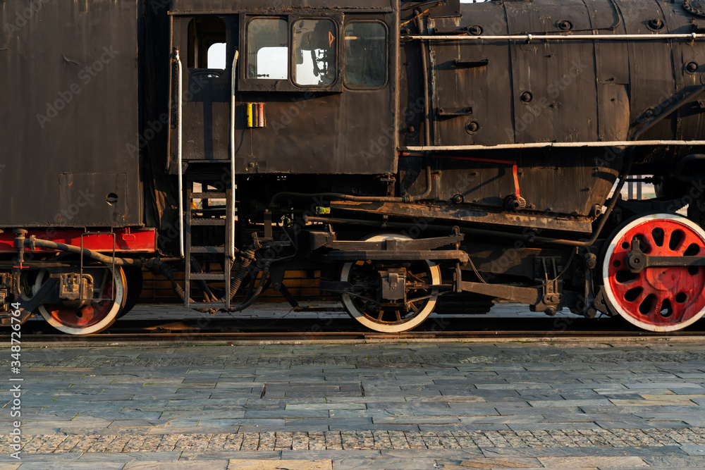 Old steam engine train and parts close-up