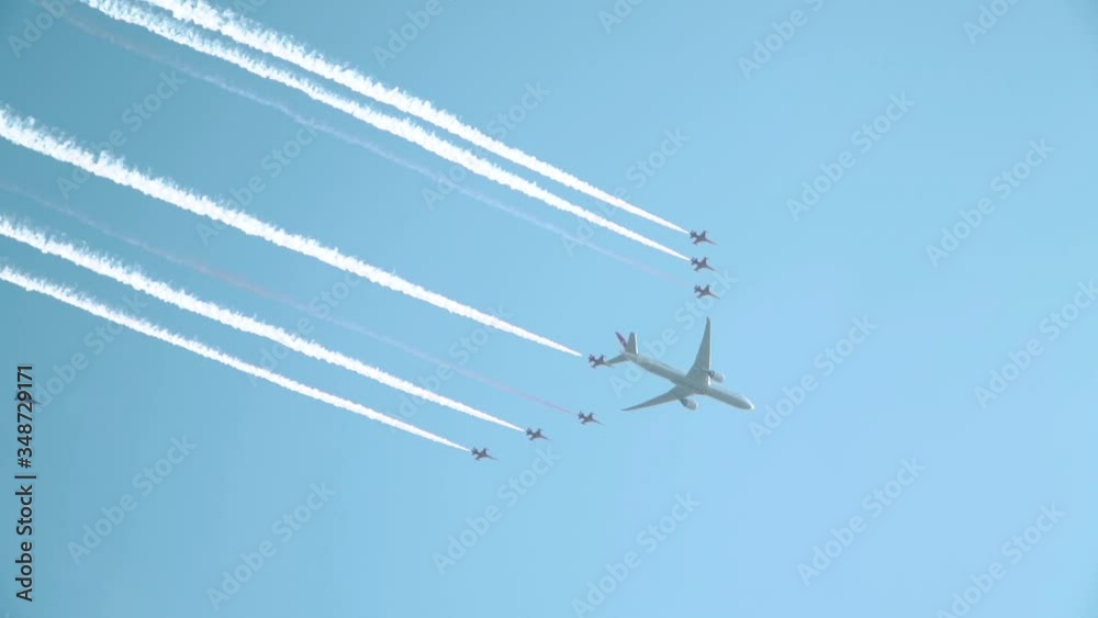 A large passenger plane accompanied by eight military fighters. Airborne Hazard Concept, Air Force. Istanbul. Turkey. 2018, sep. 17 A large passenger plane accompanied by eight military fighters. Airborne Hazard Concept, Air Force. Istanbul. Turkey. 2018, sep. 17