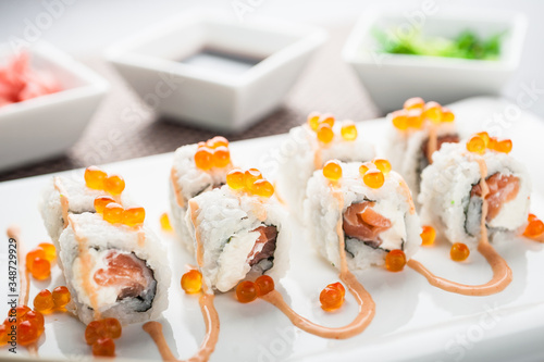 White uramaki sushi grilled salmon rolls maki