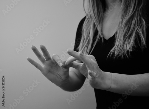 Sign language interpreter in black and white