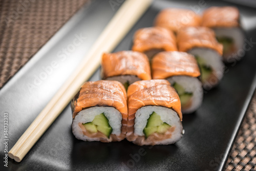 Sushi maki Sake kappa hosomaki with salmon and cucumber