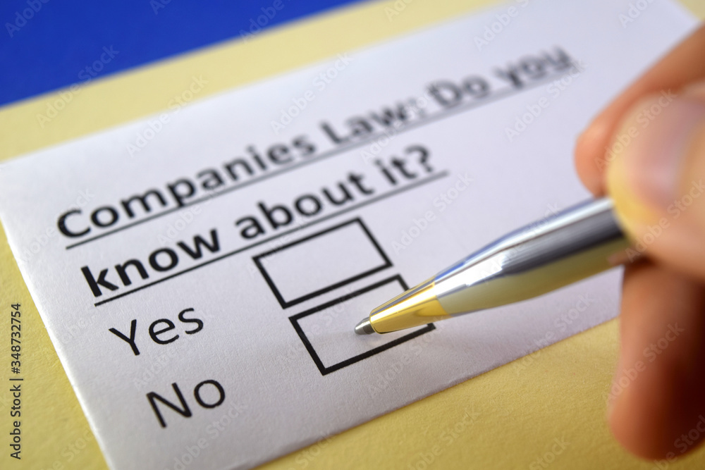 One person is answering question about companies law. One person is answering question about companies law.