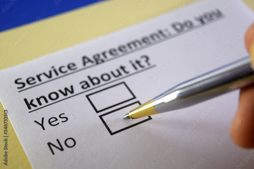 One person is answering question about service agreement. One person is answering question about service agreement.