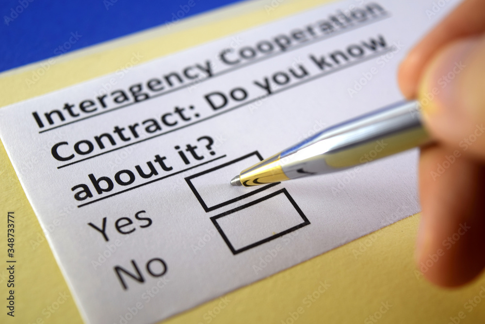 One person is answering question about interagency cooperation contracts. One person is answering question about interagency cooperation contracts.