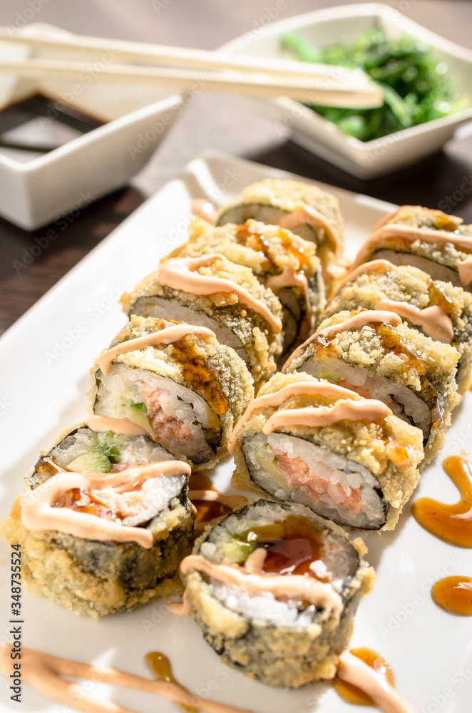 SAKE AVOKADO TEMPURA hot sushi rolls with salmon SAKE AVOKADO TEMPURA hot sushi rolls with salmon